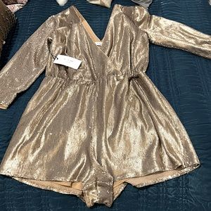 Never worn, tag still on. Ali and Jay gold sequin romper.